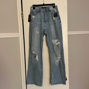These three boutique high rise wide leg Parker jeans